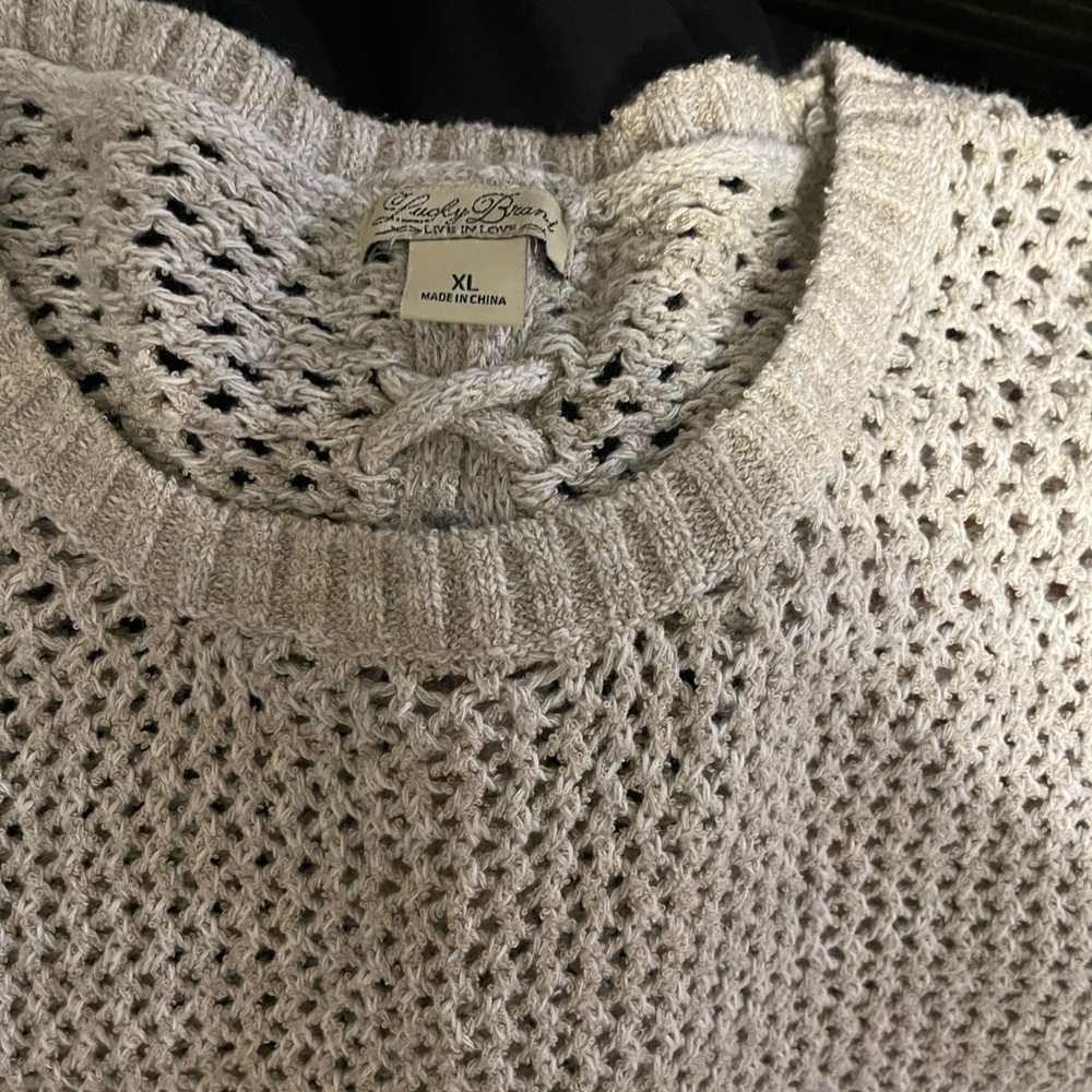 Women's Lucky oatmeal long sleeve sweater.